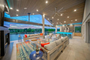 Lakefront Smart Home with Luxe Multi-Level Deck!